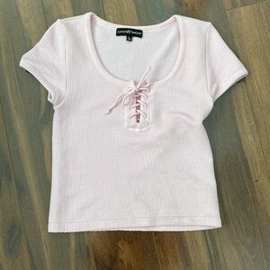 Almost Famous Light Pink Lace-Up Top.